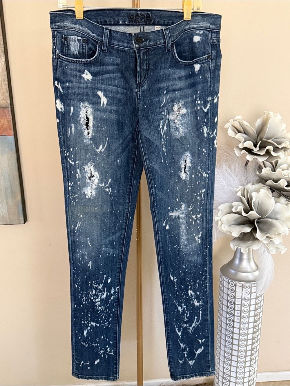 bebe Distressed Skinny Jeans in Dark Blue with White Paint Accents